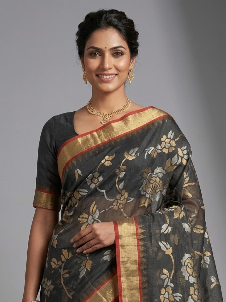 Swarnalata charcoal Jamdani saree, side profile with gold-striped pallu